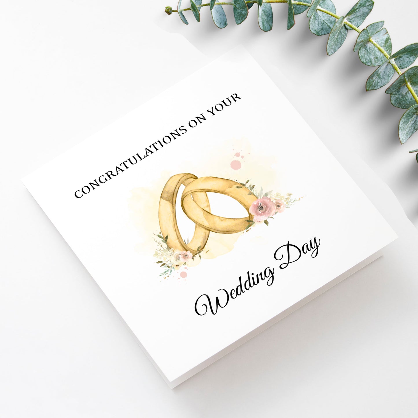 Wedding card with gold rings design